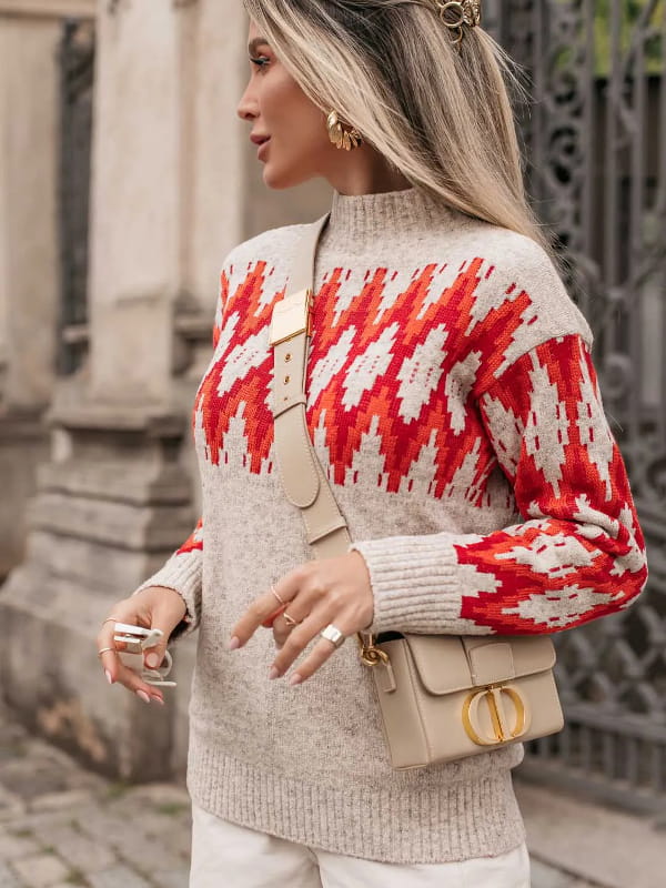 Blusa de frio de tricot: modelo vestindo uma blusa de tricot feminina detalhe jacquard marrom.